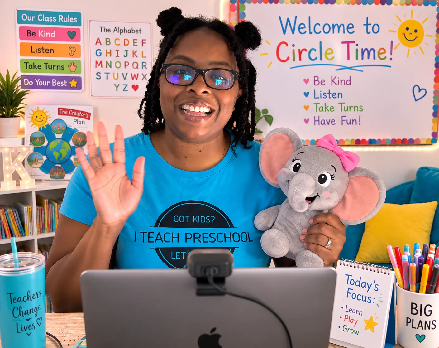 Mrs. Kiki waving hello at the start of a live online preschool Circle Time class